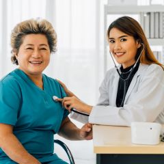 A person and a doctor talking