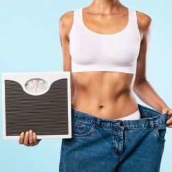 person holding a weighing equipment