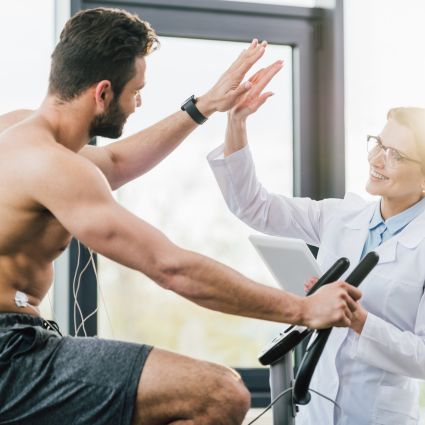 A man and a doctor doing a workout