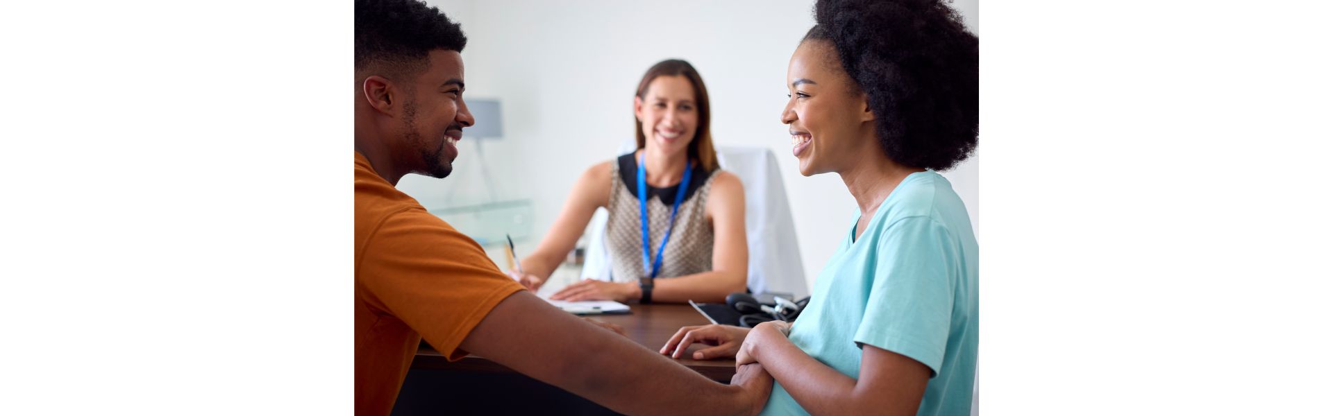 Couple talking to a healthcare person